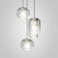 Lampa wisząca z marmuru i przezroczystego szkła nad stół