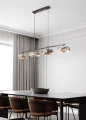 podłużna lampa marmur nad prostokątny stół nowoczesna