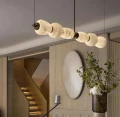Lampa wisząca alabaster Liroma – liniowy żyrandol LED do salonu i open space