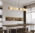 Designerska lampa wisząca z alabastru Liroma – eleganckie oświetlenie premium nad stół